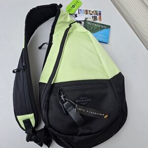 Sherpani Green and Black Sling Backpack
